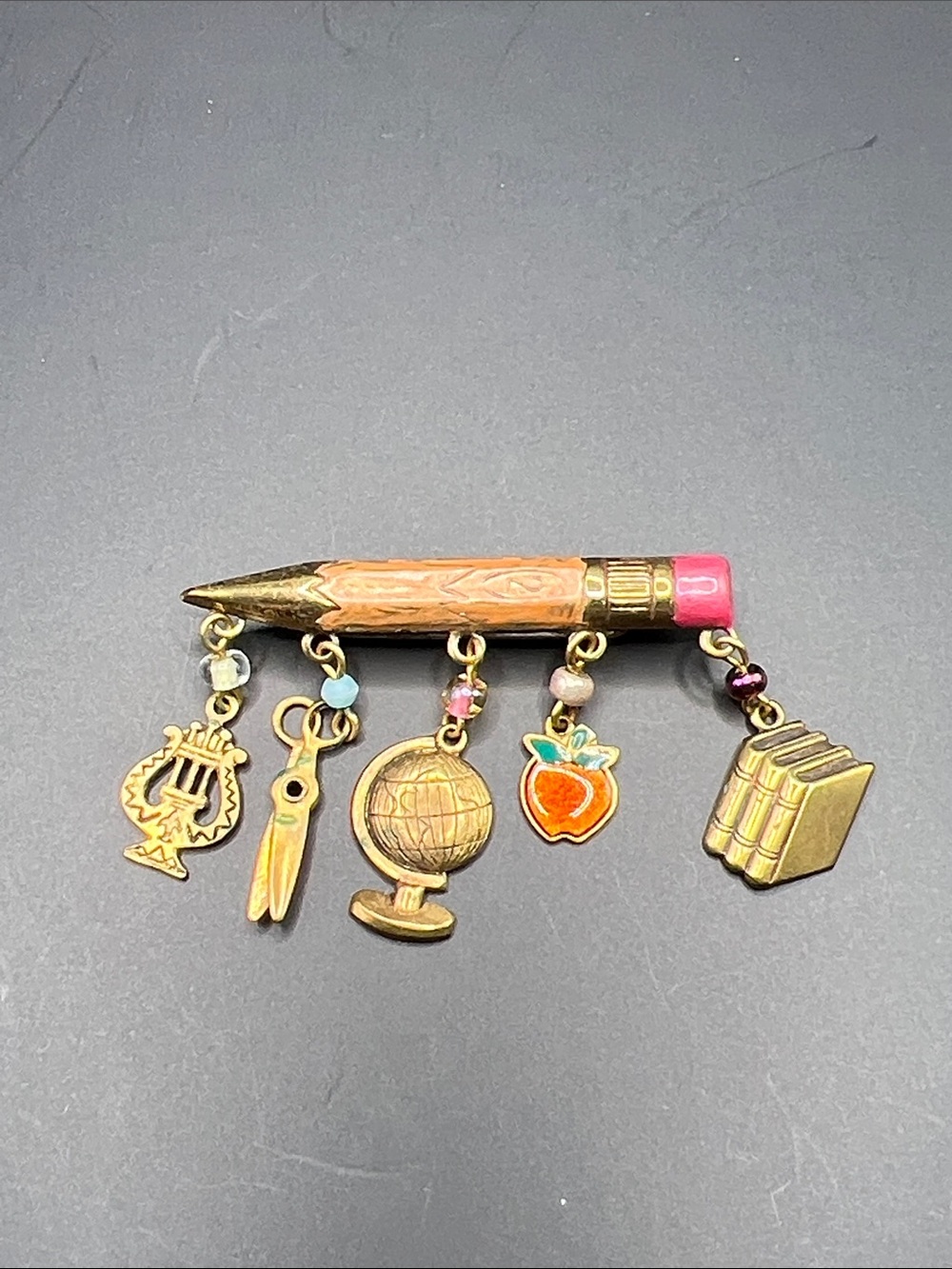 Vintage-Inspired Gold Pencil Charm Brooch with Pink Eraser and School Icons